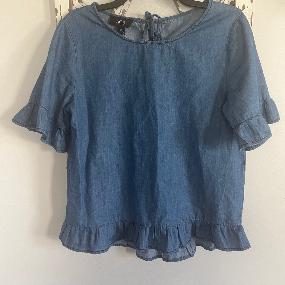 AGB denim‎ top size small with ruffle detail.